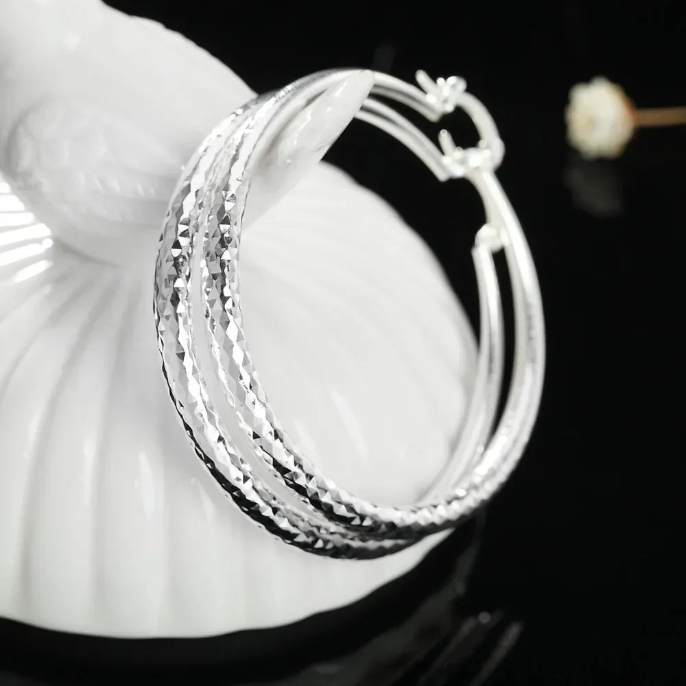 Sterling Silver Textured Hoop Earrings – Classic Shine with a Modern Twist